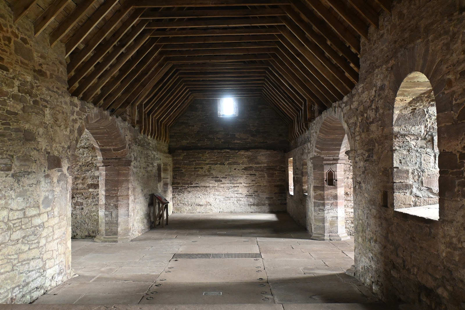 The long nave of Tullibardine Chapel under its medieval timber roof.