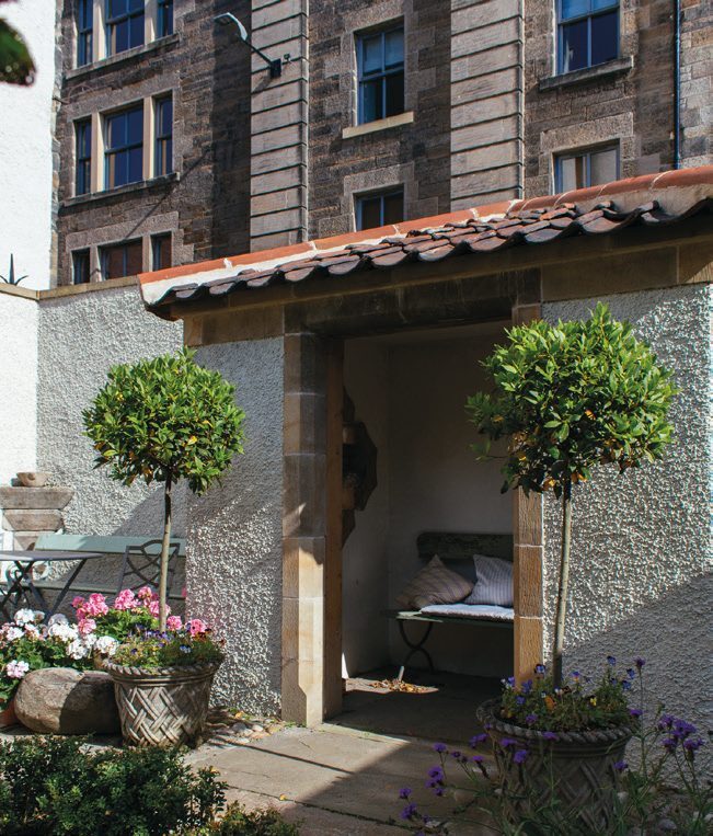Lambs Pavilion, courtyard with bay trees