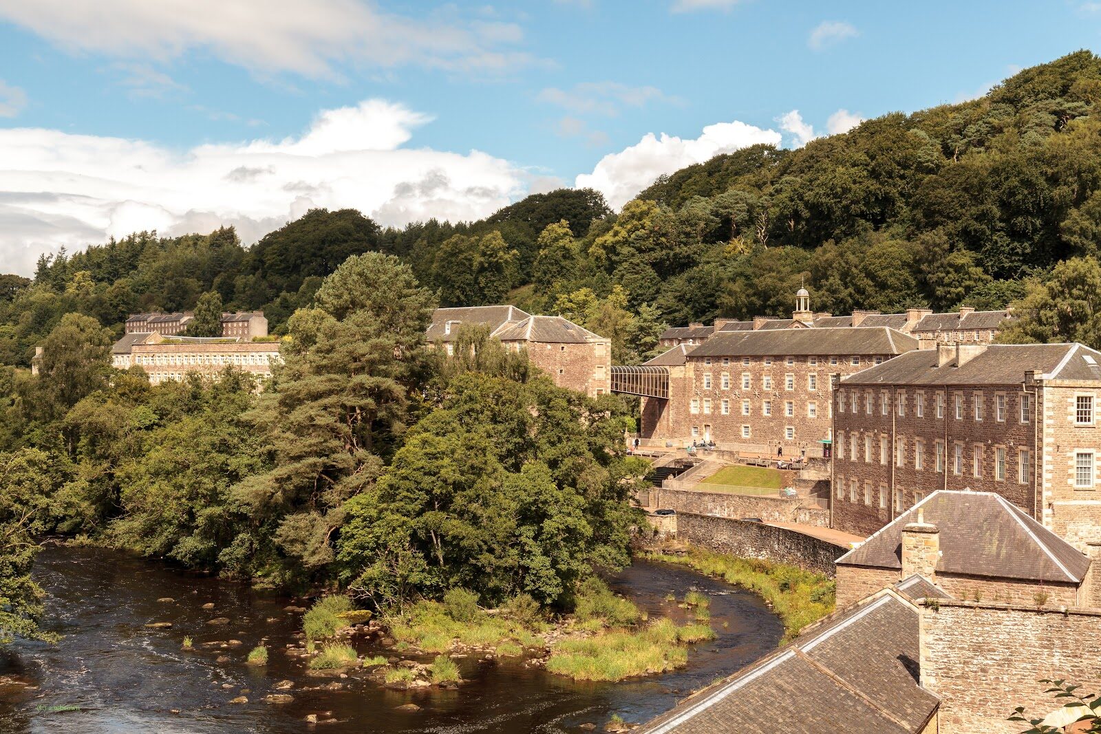 New Lanark's mill village with the children