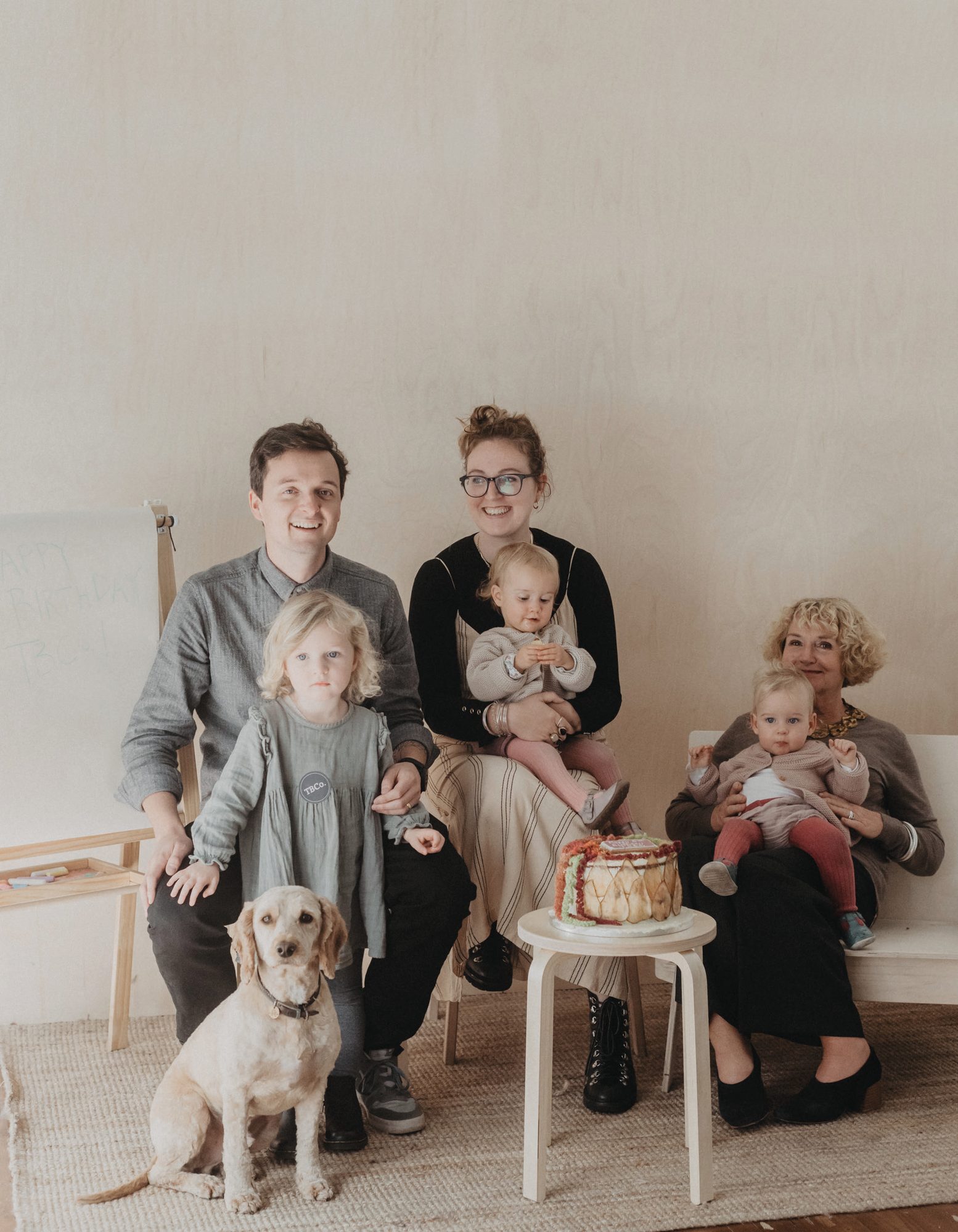 Emma and Fergus with their family and dog, opening portrait
