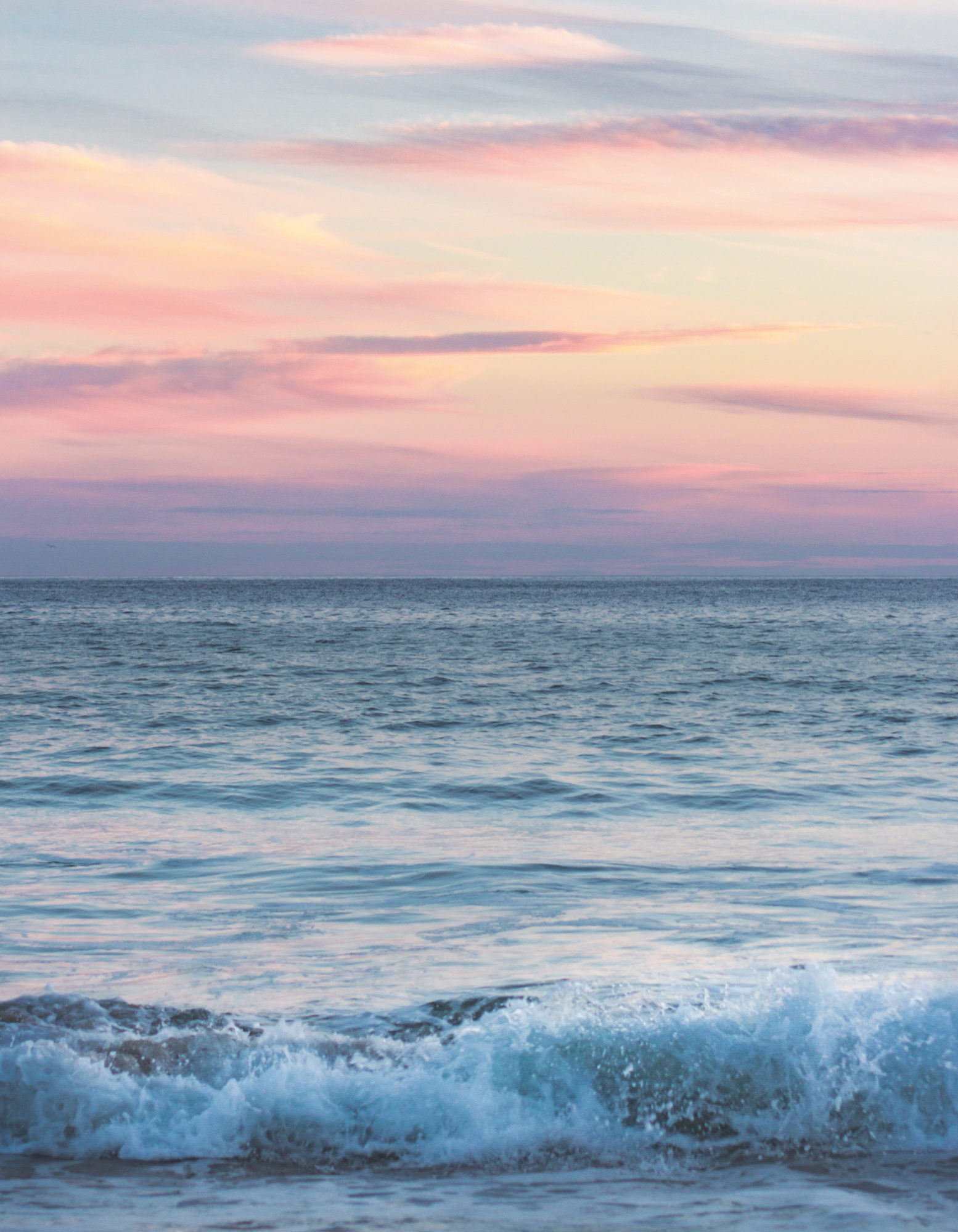 Sunset over the sea at Port of Ness, opening image