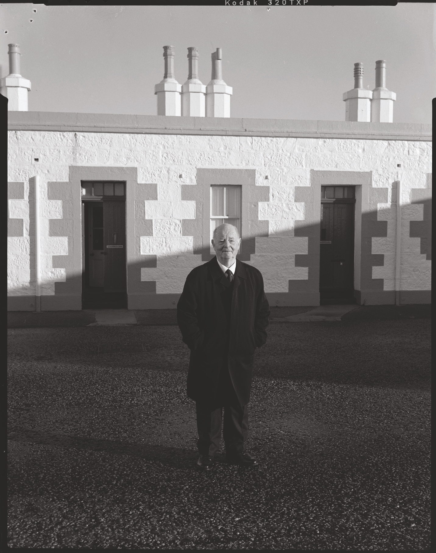 Bill Gault outside the living quarters at Kinnaird Head Lighthouse, Fraserburgh