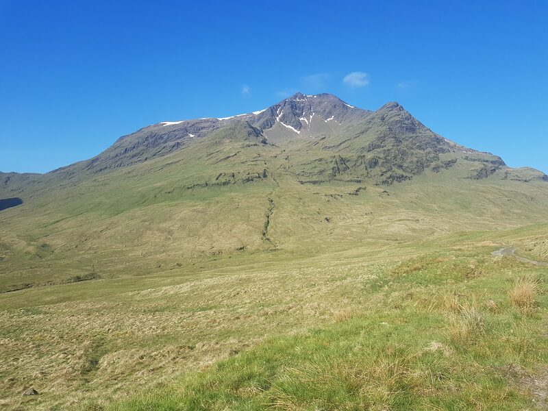 Ben Lui under a clear blue sky, streaks of snow still lying in the corrie below its twin tops.