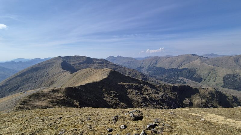 The grassy ridge of Maol Chinn-dearg, with hills ranged beyond.