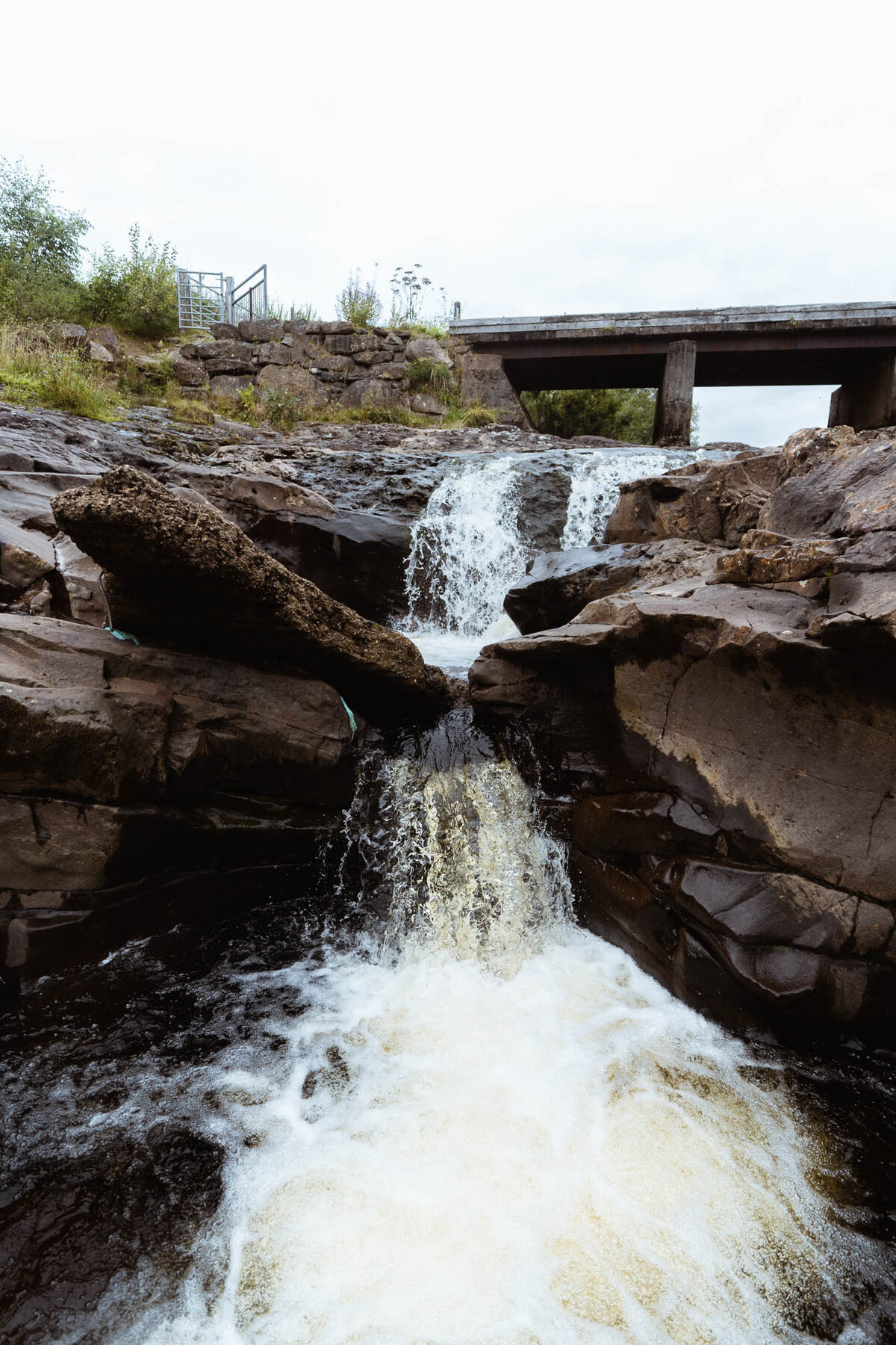 White water pouring down between rocks.