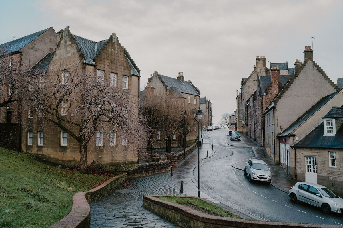 The cobbled curve of Bow Street climbing towards Stirling's Old Town.
