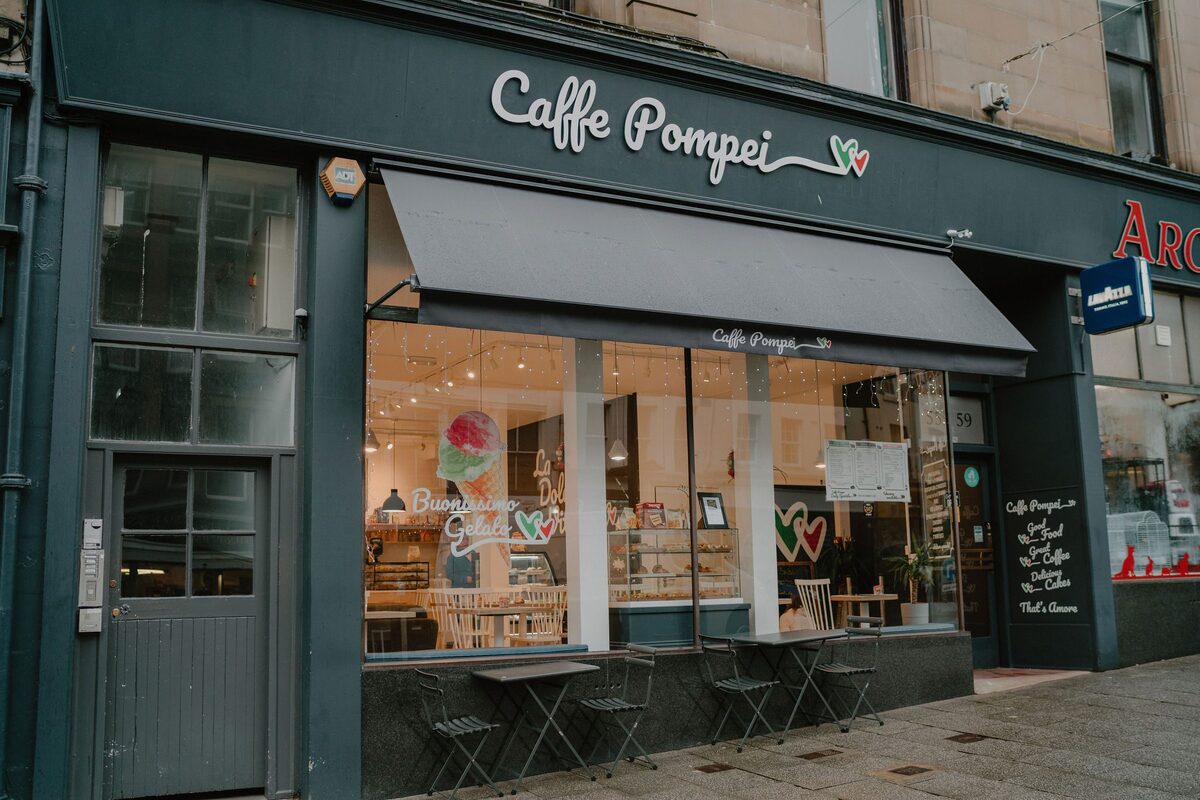 Caffe Pompei's dark blue frontage and awning on King Street, Stirling.