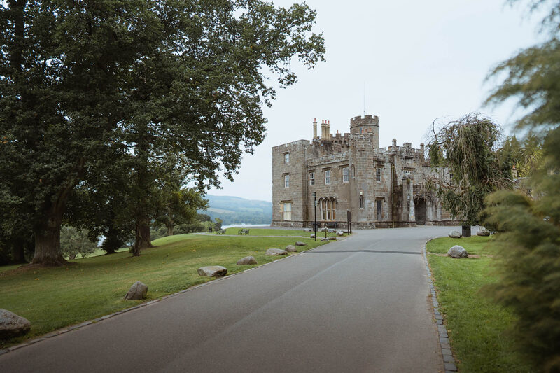 The drive through the park to Balloch Castle, the loch glimpsed beyond.