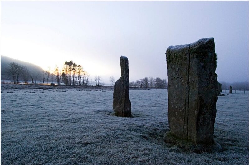 Standing stones in a frosted field in Kilmartin Glen.