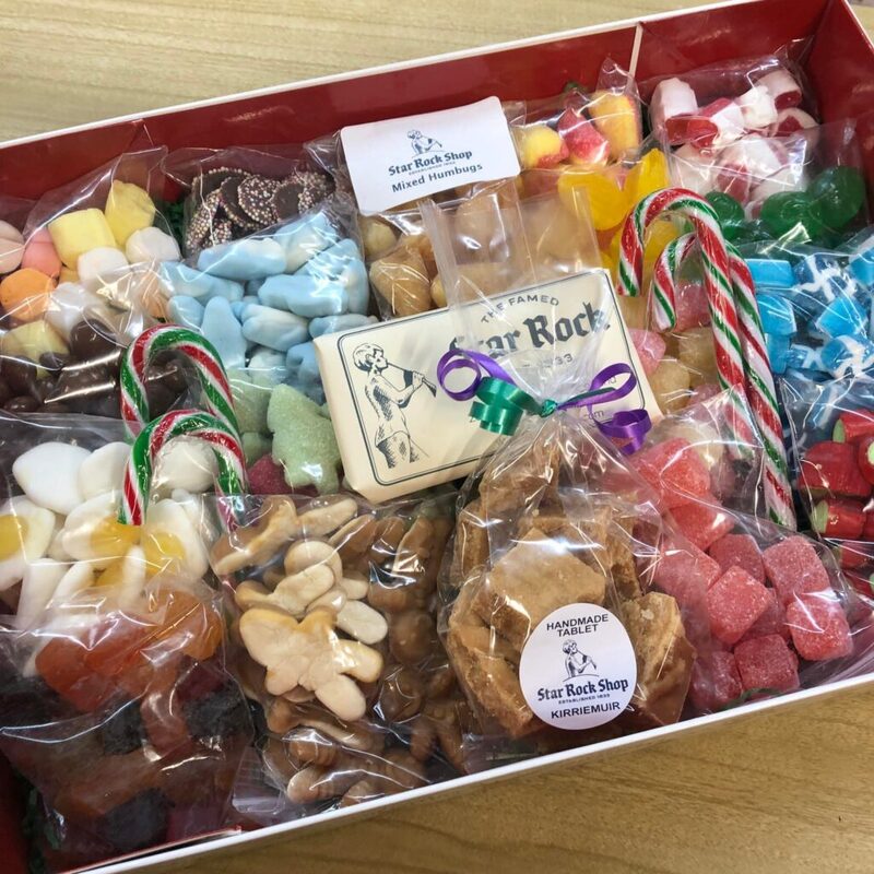 Red box of assorted sweets from Star Rock Shop, including humbugs, tablet and candy canes